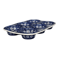 A picture of a Polish Pottery Muffin Pan (Lone Star) | F093T-LG01 as shown at PolishPotteryOutlet.com/products/muffin-pan-lone-star-f093t-lg01