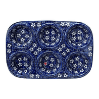 A picture of a Polish Pottery Muffin Pan (Lone Star) | F093T-LG01 as shown at PolishPotteryOutlet.com/products/muffin-pan-lone-star-f093t-lg01
