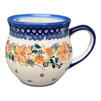 A picture of a Polish Pottery 12 oz. Belly Mug (Orange Bouquet) | GK04B-UWP2 as shown at PolishPotteryOutlet.com/products/12-oz-belly-mug-orange-bouquet-gk04b-uwp2