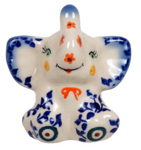 A picture of a Polish Pottery Small Sitting Elephant Figurine (Peacock Vine) | GZW15A-UPL as shown at PolishPotteryOutlet.com/products/small-elephant-figurine-upl-1