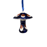 A picture of a Polish Pottery Small Mushroom Ornament (Pheasant Feathers) | K029T-52 as shown at PolishPotteryOutlet.com/products/small-mushroom-ornament-52-k029t-52