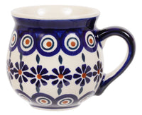 A picture of a Polish Pottery Small Belly Mug (Floral Peacock) | K067T-54KK as shown at PolishPotteryOutlet.com/products/small-belly-mug-floral-peacock