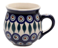 A picture of a Polish Pottery Small Belly Mug (Peacock) | K067T-54 as shown at PolishPotteryOutlet.com/products/small-belly-mug-peacock-k067t-54