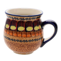 A picture of a Polish Pottery Small Belly Mug (Desert Sunrise) | K067U-KLJ as shown at PolishPotteryOutlet.com/products/small-belly-mug-desert-sunrise