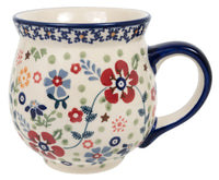 A picture of a Polish Pottery Large Belly Mug (Full Bloom) | K068S-EO34 as shown at PolishPotteryOutlet.com/products/large-belly-mug-full-bloom