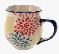 A picture of a Polish Pottery Large Belly Mug (Zinnia Bouquet) | K068S-IS05 as shown at PolishPotteryOutlet.com/products/large-belly-mug-zinnia-bouquet