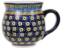 A picture of a Polish Pottery Large Belly Mug (Floral Formation) | K068S-WKK as shown at PolishPotteryOutlet.com/products/large-belly-mug-floral-formation