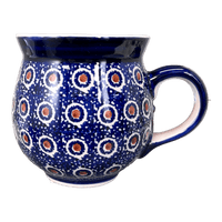 A picture of a Polish Pottery Large Belly Mug (Bonbons) | K068T-2 as shown at PolishPotteryOutlet.com/products/large-belly-mug-2-k068t-2