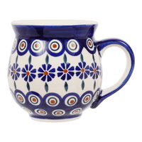 A picture of a Polish Pottery Large Belly Mug (Floral Peacock) | K068T-54KK as shown at PolishPotteryOutlet.com/products/large-belly-mug-floral-peacock