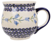 A picture of a Polish Pottery Large Belly Mug (Lily of the Valley) | K068T-ASD as shown at PolishPotteryOutlet.com/products/large-belly-mug-lily-of-the-valley