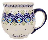 A picture of a Polish Pottery Large Belly Mug (Peacock's Pride) | K068T-DPPP as shown at PolishPotteryOutlet.com/products/large-belly-mug-peacocks-pride