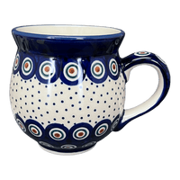 A picture of a Polish Pottery Large Belly Mug (Peacock Dot) | K068U-54K as shown at PolishPotteryOutlet.com/products/large-belly-mug-peacock-dot-k068u-54k