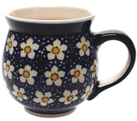 A picture of a Polish Pottery Mug, Belly Mug, 16oz Large in "Paperwhites" by Manufaktura | K068T-TJP as shown at PolishPotteryOutlet.com/products/large-belly-mug-paperwhites-k068t-tjp