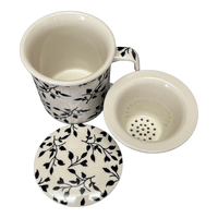 A picture of a Polish Pottery Tea Infuser Mug Set (Black Spray) | K073T-LISC as shown at PolishPotteryOutlet.com/products/tea-infuser-mug-set-black-spray-k073t-lisc