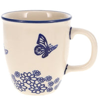 A picture of a Polish Pottery Mug, Mars Mug, 10oz Small in "Butterfly Garden" by Manufaktura | K081T-MOT1 as shown at PolishPotteryOutlet.com/products/mars-mug-butterfly-garden