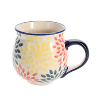 A picture of a Polish Pottery Medium Belly Mug (Zinnia Bouquet) | K090S-IS05 as shown at PolishPotteryOutlet.com/products/the-medium-belly-mug-zinnia-bouquet