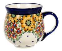 A picture of a Polish Pottery Medium Belly Mug (Autumn Harvest) | K090S-LB as shown at PolishPotteryOutlet.com/products/the-medium-belly-mug-autumn-harvest