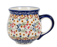 A picture of a Polish Pottery Medium Belly Mug (Wildflower Delight) | K090S-P273 as shown at PolishPotteryOutlet.com/products/the-medium-belly-mug-wildflower-delight