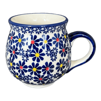 A picture of a Polish Pottery Medium Belly Mug (Field of Daisies) | K090S-S001 as shown at PolishPotteryOutlet.com/products/the-medium-belly-mug-s001-k090s-s001