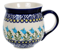 A picture of a Polish Pottery Medium Belly Mug (Riverdance) | K090T-IZ3 as shown at PolishPotteryOutlet.com/products/the-medium-belly-mug-riverdance