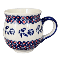 A picture of a Polish Pottery Medium Belly Mug (Swedish Flower) | K090T-KLK as shown at PolishPotteryOutlet.com/products/the-medium-belly-mug-klk-k090t-klk