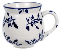 A picture of a Polish Pottery Medium Belly Mug (Blue Spray) | K090T-LISK as shown at PolishPotteryOutlet.com/products/the-medium-belly-mug-blue-spray