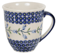 A picture of a Polish Pottery Large Mars Mug (Lily of the Valley) | K106T-ASD as shown at PolishPotteryOutlet.com/products/the-large-mars-mug-lily-of-the-valley