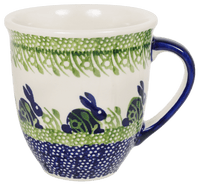 A picture of a Polish Pottery Large Mars Mug (Bunny Love) | K106T-P324 as shown at PolishPotteryOutlet.com/products/the-large-mars-mug-bunny-love
