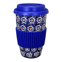 A picture of a Polish Pottery Travel Mug (Bonbons) | K115T-2 as shown at PolishPotteryOutlet.com/products/travel-mug-bonbons-k115t-2