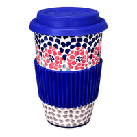 A picture of a Polish Pottery Travel Mug (Falling Petals) | K115U-AS72 as shown at PolishPotteryOutlet.com/products/travel-mug-falling-petals-k115u-as72