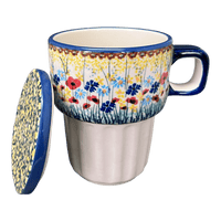 A picture of a Polish Pottery Lidded Mug (Sunlit Wildflowers) | K131S-WK77 as shown at PolishPotteryOutlet.com/products/tea-steeper-travel-mug-sunlit-wildflowers-k131s-wk77