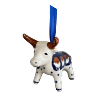 A picture of a Polish Pottery Bull Ornament (Pheasant Feathers) | K167T-52 as shown at PolishPotteryOutlet.com/products/bull-ornament-pheasant-feathers-k167t-52