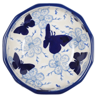 A picture of a Polish Pottery Multangular Bowl (Blue Butterfly) | M058U-AS58 as shown at PolishPotteryOutlet.com/products/multi-angular-multi-use-bowl-blue-butterfly