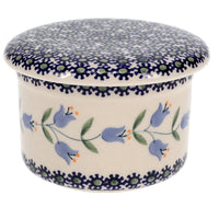 A picture of a Polish Pottery Butter Crock (Lily of the Valley) | M136T-ASD as shown at PolishPotteryOutlet.com/products/butter-crock-lily-of-the-valley-m136t-asd