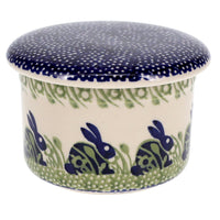 A picture of a Polish Pottery Butter Crock (Bunny Love) | M136T-P324 as shown at PolishPotteryOutlet.com/products/butter-crock-bunny-love-m136t-p324