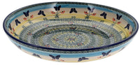 A picture of a Polish Pottery 11.75" Shallow Salad Bowl (Butterflies in Flight) | M173S-WKM as shown at PolishPotteryOutlet.com/products/11-75-bowl-butterflies-in-flight-m173s-wkm