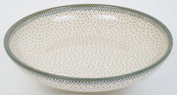 A picture of a Polish Pottery 11.75" Shallow Salad Bowl (Misty Green) | M173U-61Z as shown at PolishPotteryOutlet.com/products/11-3-4-shallow-salad-bowl-misty-green