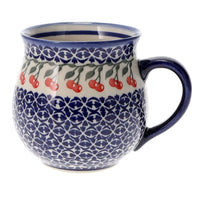 A picture of a Polish Pottery 16 oz. Large Belly Mug (Cherries Jubilee) | NDA10-29 as shown at PolishPotteryOutlet.com/products/large-belly-mug-cherries-jubilee