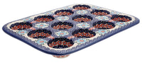 A picture of a Polish Pottery 12 Cup Mini Muffin Pan (Daisy Waves) | NDA169-3 as shown at PolishPotteryOutlet.com/products/12-cup-mini-muffin-pan-daisy-waves-nda169-3