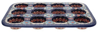 A picture of a Polish Pottery 12 Cup Mini Muffin Pan (Daisy Waves) | NDA169-3 as shown at PolishPotteryOutlet.com/products/12-cup-mini-muffin-pan-daisy-waves-nda169-3