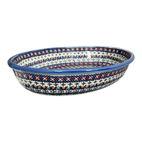 A picture of a Polish Pottery Oval Baker (Bowties & Blossoms) | NDA187-21 as shown at PolishPotteryOutlet.com/products/oval-baker-bowties-blossoms-nda187-21