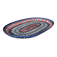 A picture of a Polish Pottery Shallow 7" x 11" Oval Plate (Pom-Pom Flower) | NDA245-30 as shown at PolishPotteryOutlet.com/products/shallow-7-x-11-oval-plate-pom-pom-flower-nda245-30