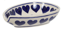 A picture of a Polish Pottery Small Spoon Rest (Whole Hearted) | P093T-SEDU as shown at PolishPotteryOutlet.com/products/spoon-rest-whole-hearted