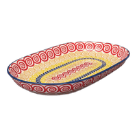 A picture of a Polish Pottery 7"x11" Oval Roaster (Psychedelic Swirl) | P099M-CMZK as shown at PolishPotteryOutlet.com/products/7x11-oval-roaster-psychedelic-swirl-p099m-cmzk