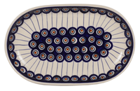 A picture of a Polish Pottery 7"x11" Oval Roaster (Peacock in Line) | P099T-54A as shown at PolishPotteryOutlet.com/products/7x11-oval-roaster-peacock-in-line-p099t-54a