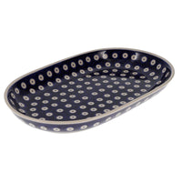 A picture of a Polish Pottery 7"x11" Oval Roaster (Dot to Dot) | P099T-70A as shown at PolishPotteryOutlet.com/products/7x11-oval-roaster-dot-to-dot