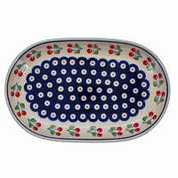A picture of a Polish Pottery 7"x11" Oval Roaster (Cherry Dot) | P099T-70WI as shown at PolishPotteryOutlet.com/products/7x11-oval-roaster-cherry-dot