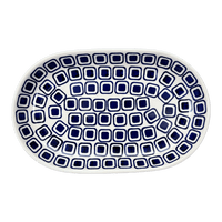 A picture of a Polish Pottery 7"x11" Oval Roaster (Navy Retro) | P099U-601A as shown at PolishPotteryOutlet.com/products/7x11-oval-roaster-navy-retro-p099u-601a