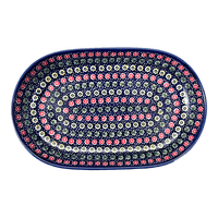 A picture of a Polish Pottery 7"x11" Oval Roaster (Rings of Flowers) | P099U-DH17 as shown at PolishPotteryOutlet.com/products/7x11-oval-roaster-dh17-p099u-dh17