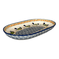 A picture of a Polish Pottery 7"x11" Oval Roaster (Ducks in a Row) | P099U-P323 as shown at PolishPotteryOutlet.com/products/7x11-oval-roaster-ducks-in-a-row-p099u-p323